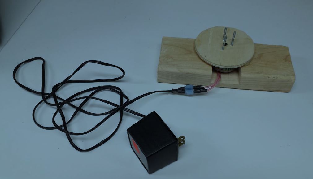 The image shows a motorized spinner that will allow balls (exoplanets) to be attached for a experimt showing the albedo effec