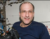 An image  shows astronaut Don Pettit while on board the Space Station.